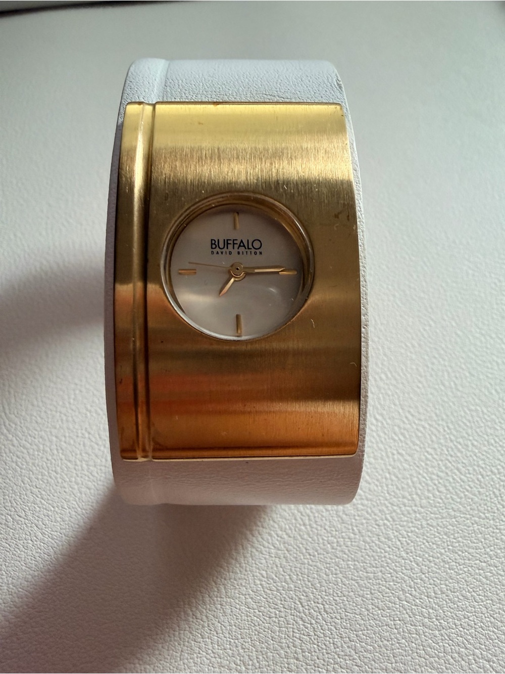Buffalo David Bitton Gold Tone Face with White Cuff Bracelet Watch